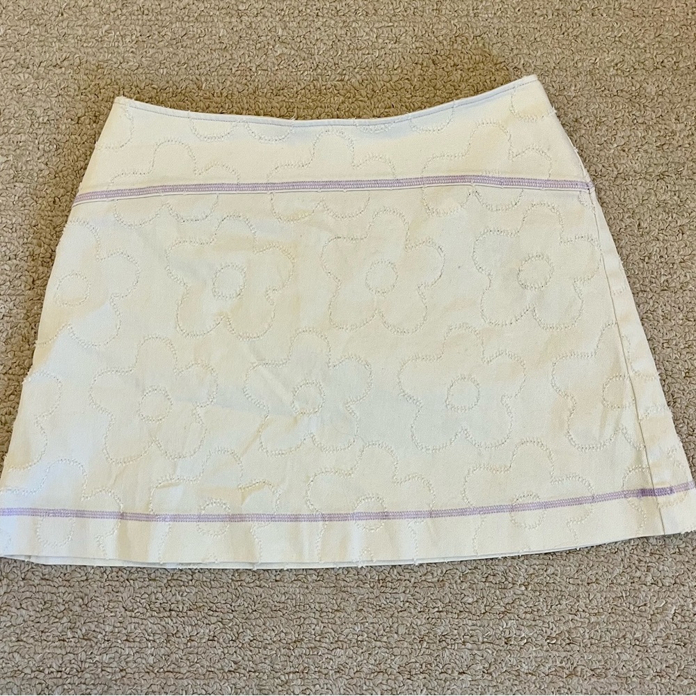 White flower skirt with purple lining